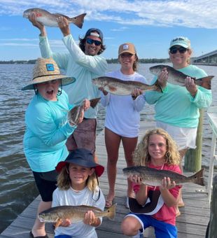 Family Fishing for Redfish in Florida